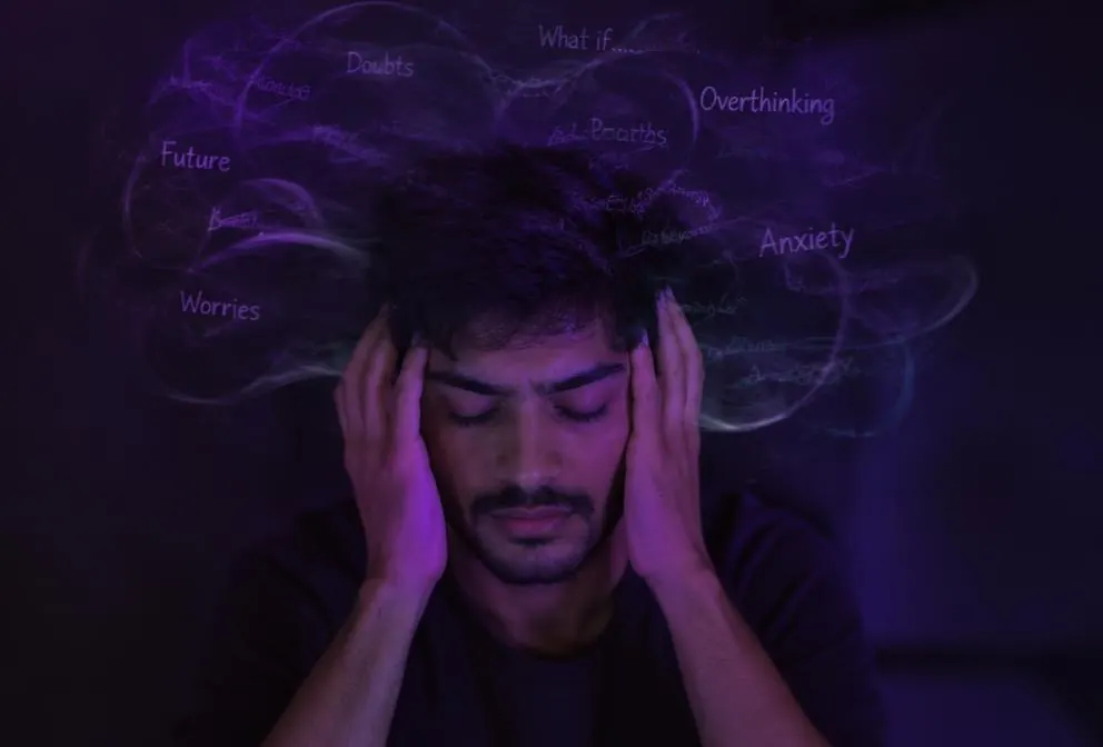 Indian professional dealing with internal distractions
